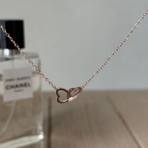 Collana cuori intrecciati rosé