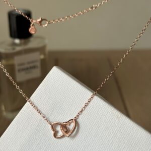 Collana cuori intrecciati rosé